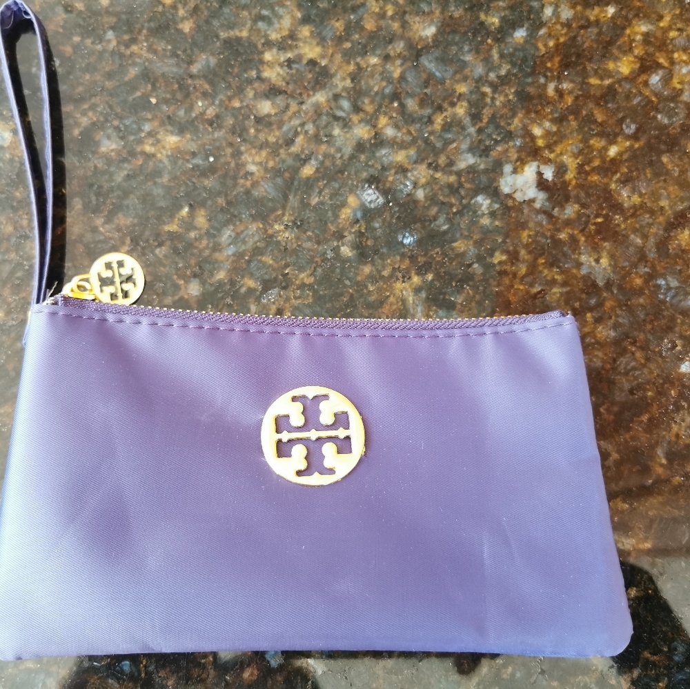 2 purses, 1 purple, 1 black
